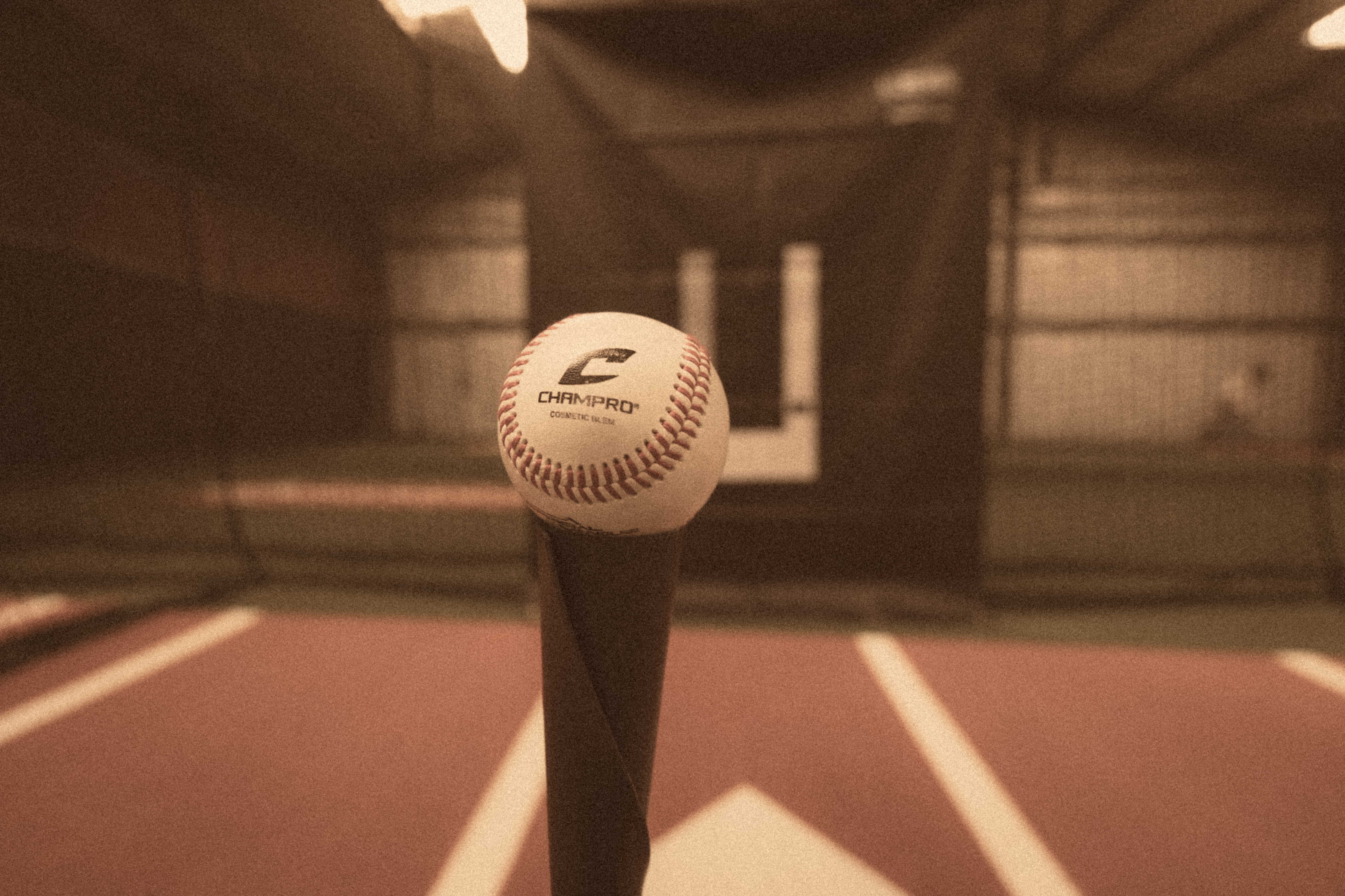 Baseball on bat with tunnel perspective